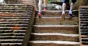 People Walking Up Outside Stairs