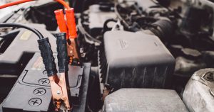 Jumper cables on car battery | Priority Toyota Chesapeake
